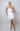 Crisscross Surprise White Backless Tiered Dress